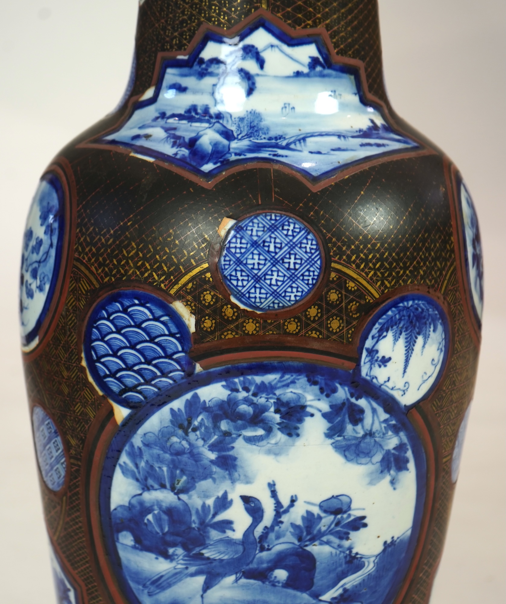 A large Japanese blue and white and gilt lacquered vase, late 19th century
